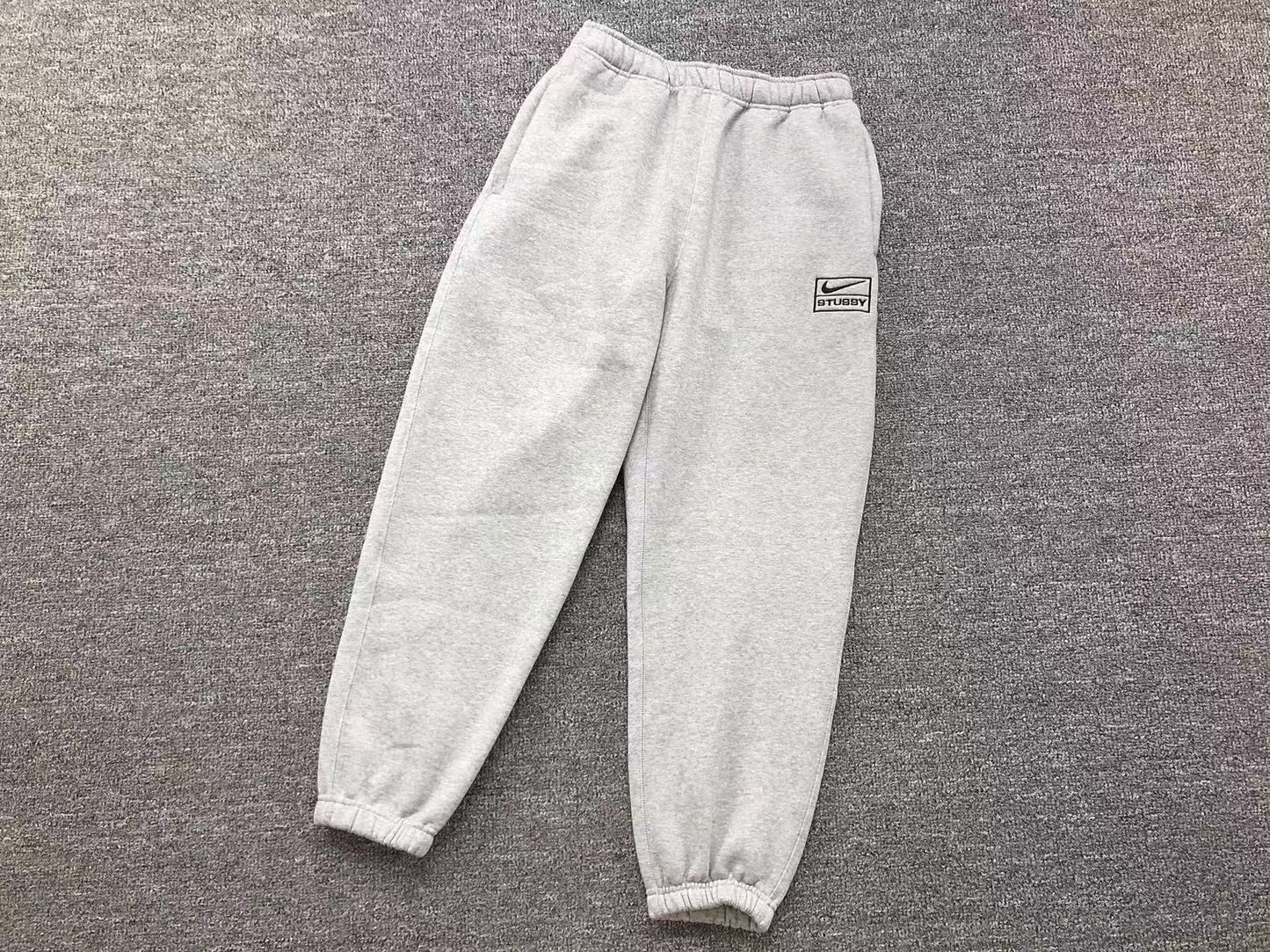 Conjuntos Nike Stussy Cinza